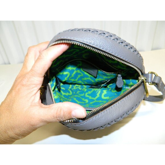 Oryany Kaye Round Whip Stitch Pebbled Leather Crossbody Bag Tassel & Adj Strap - Picture 14 of 16